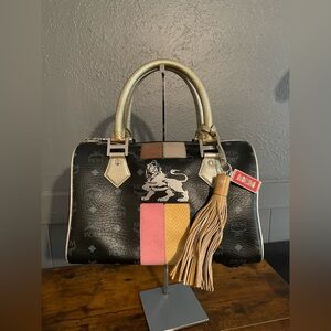 MCM Princess Lion Black and Gold Women's Bag